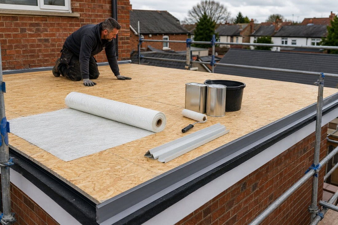 Roofer checking an OSB3 flat roof deck with GRP matting, resin and trims ready for installation.