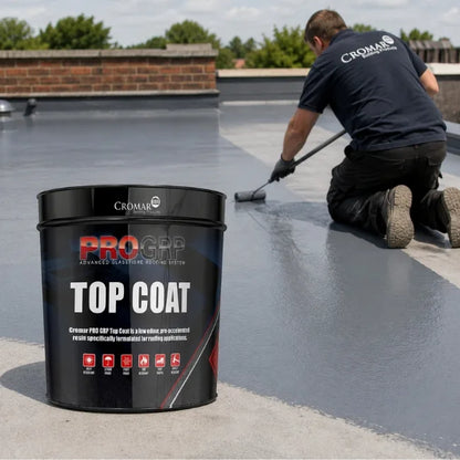 Cromar PRO GRP Top Coat on grey flat roof surface with roller showing smooth waterproof roof finish