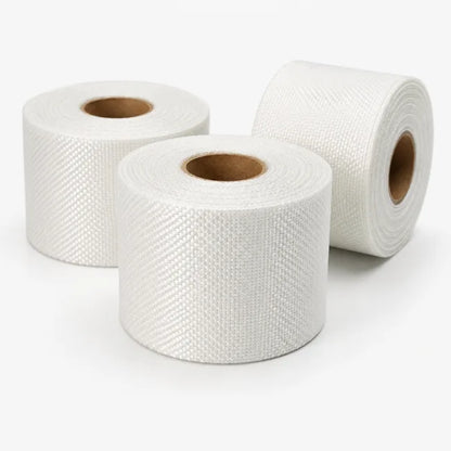 Close up of woven fibreglass tape rolls used for roof repair and laminate reinforcement
